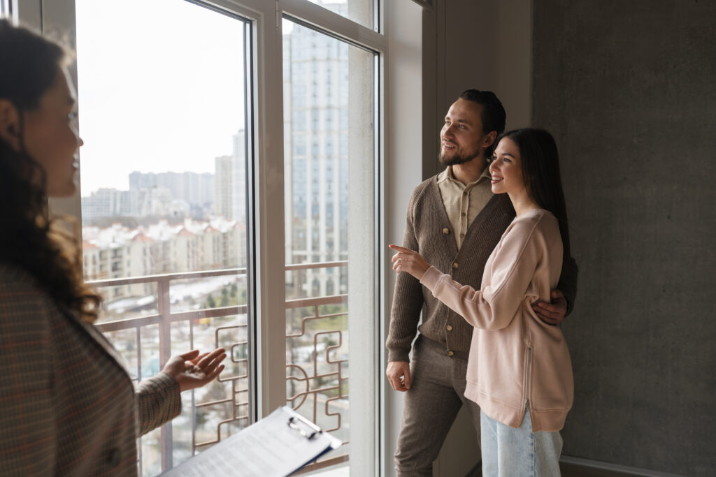 side view real estate-agent presenting house